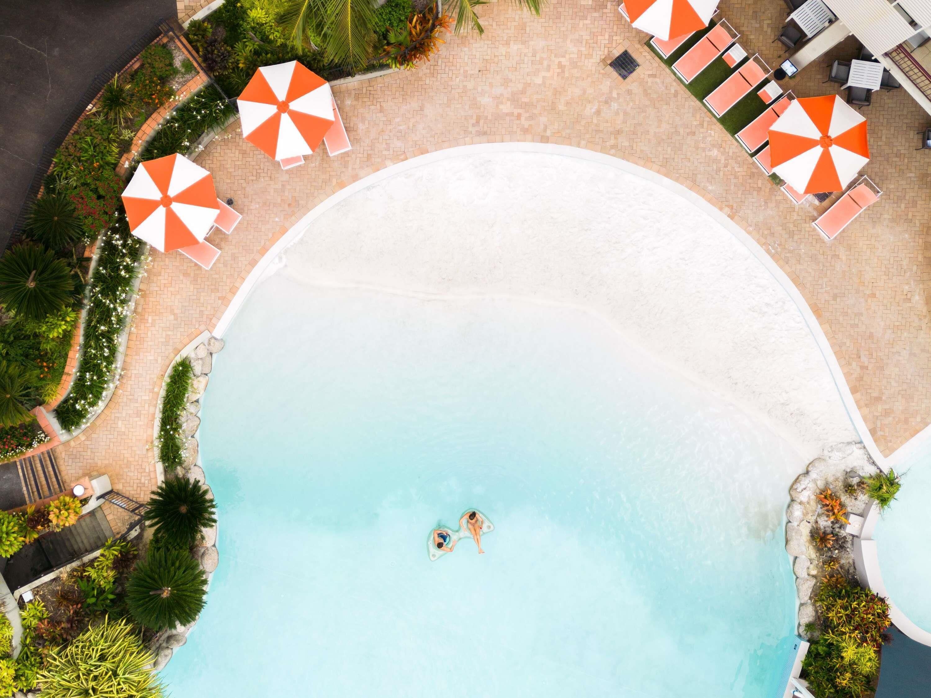 Outdoor pool, pool umbrellas, pool loungers
