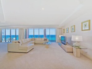 Superior Apartment, 4 Bedrooms, Ocean View | Living area | 55-inch flat-screen TV with cable channels, TV, DVD player