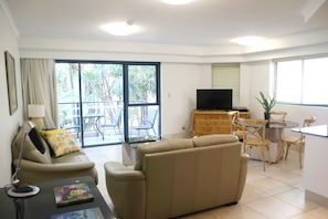 42-inch TV with cable channels, DVD player