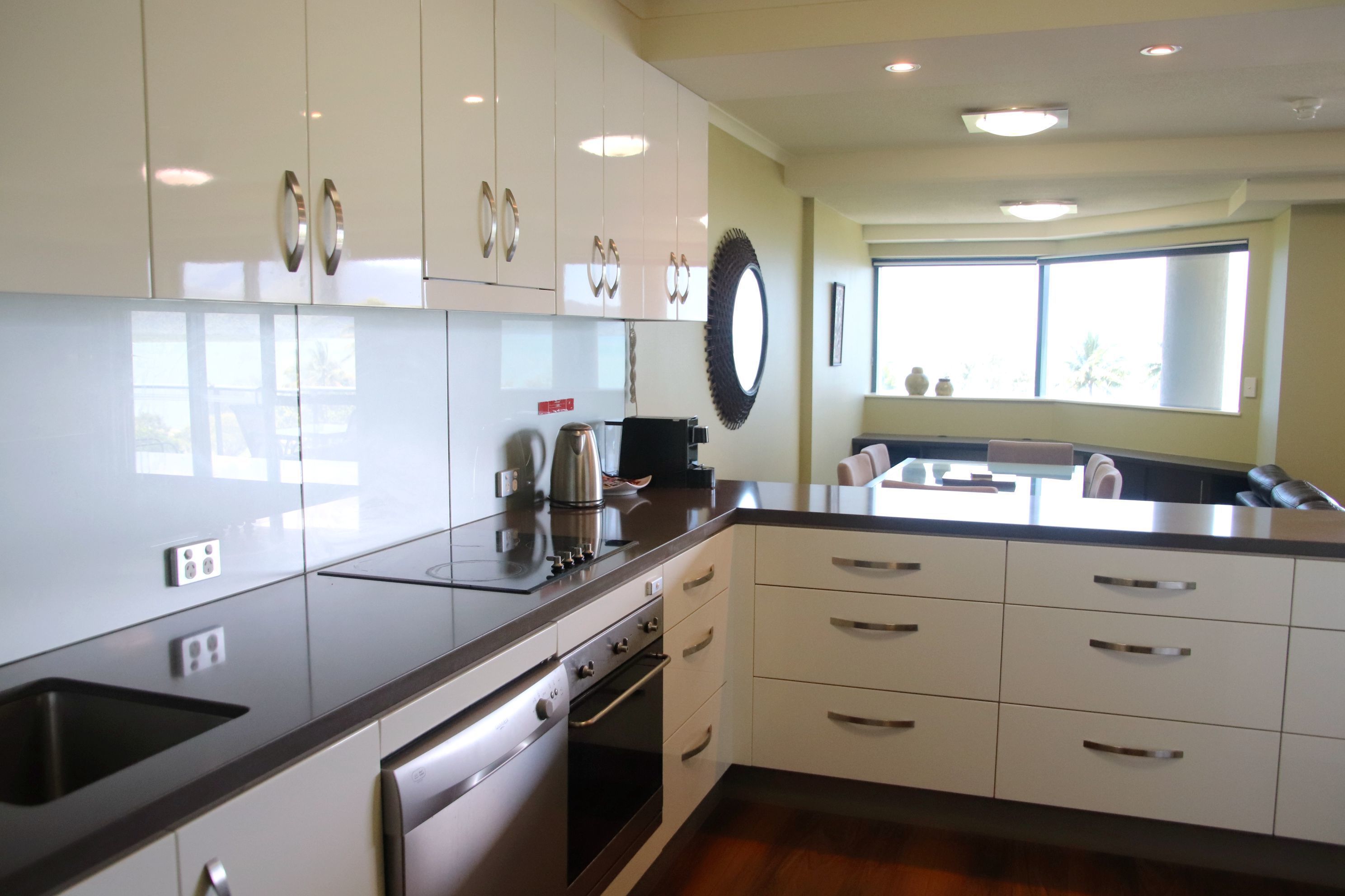 Full-sized fridge, microwave, stovetop, dishwasher