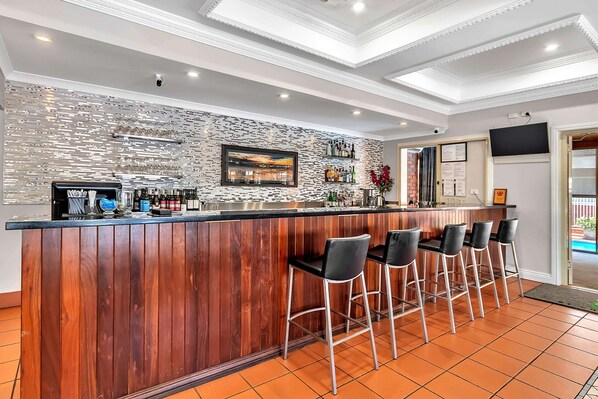 Breakfast, lunch, dinner served; international cuisine, pool views 