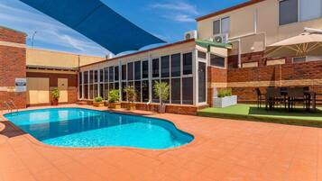 Outdoor pool, open 6:00 AM to 5:00 PM, pool umbrellas, sun loungers