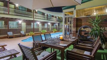 Outdoor pool, open 6:00 AM to 5:00 PM, pool umbrellas, sun loungers