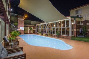 Outdoor pool, open 6:00 AM to 5:00 PM, pool umbrellas, pool loungers