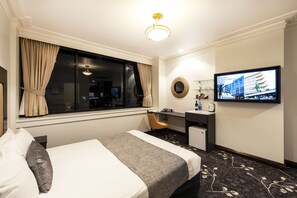 Ropa de cama de alta calidad y minibar 