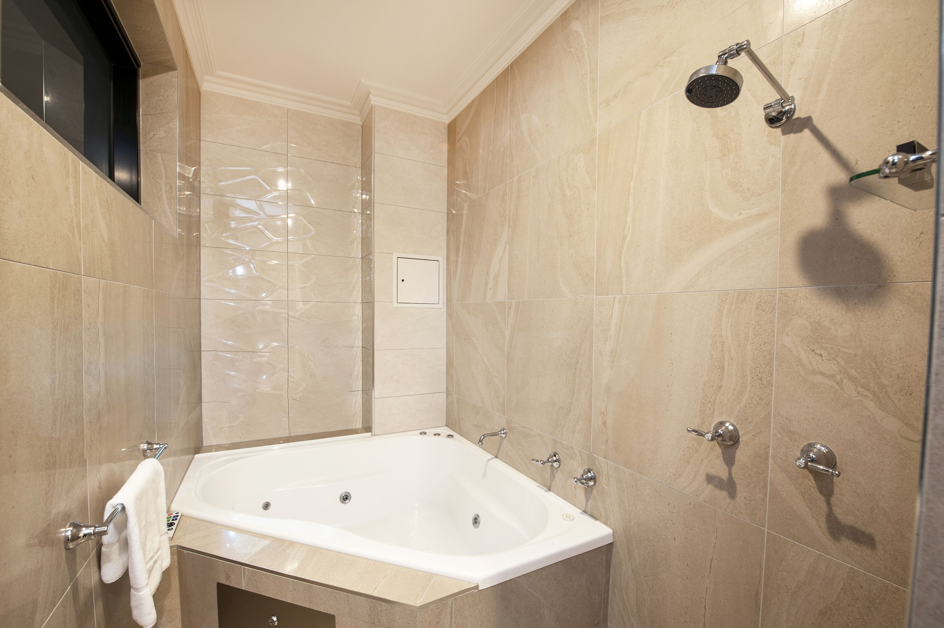 luxury suite, 1 queen bed, jetted tub | bathroom | designer toiletries, hair dryer, towels, soap
