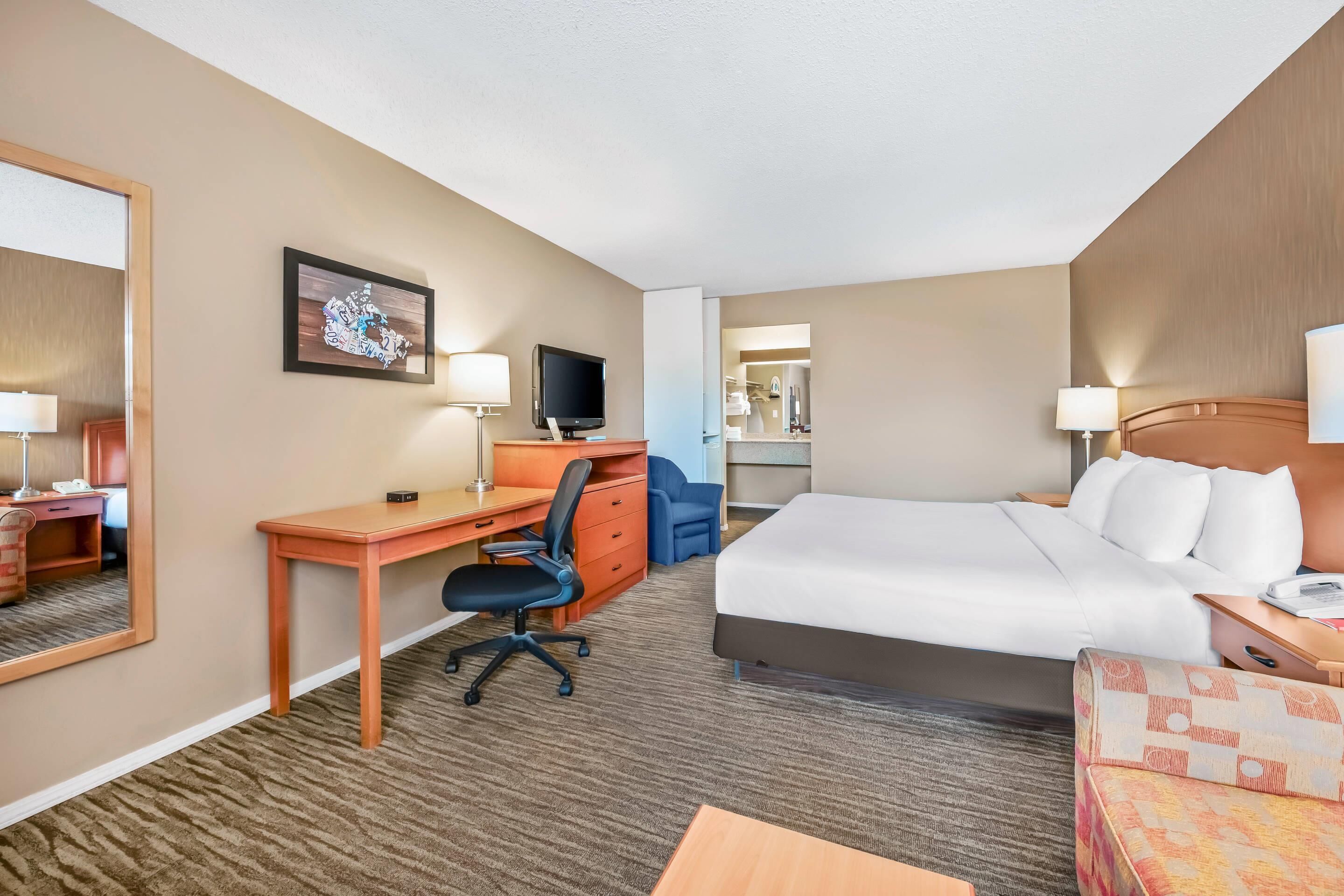 Premium bedding, desk, blackout curtains, iron/ironing board