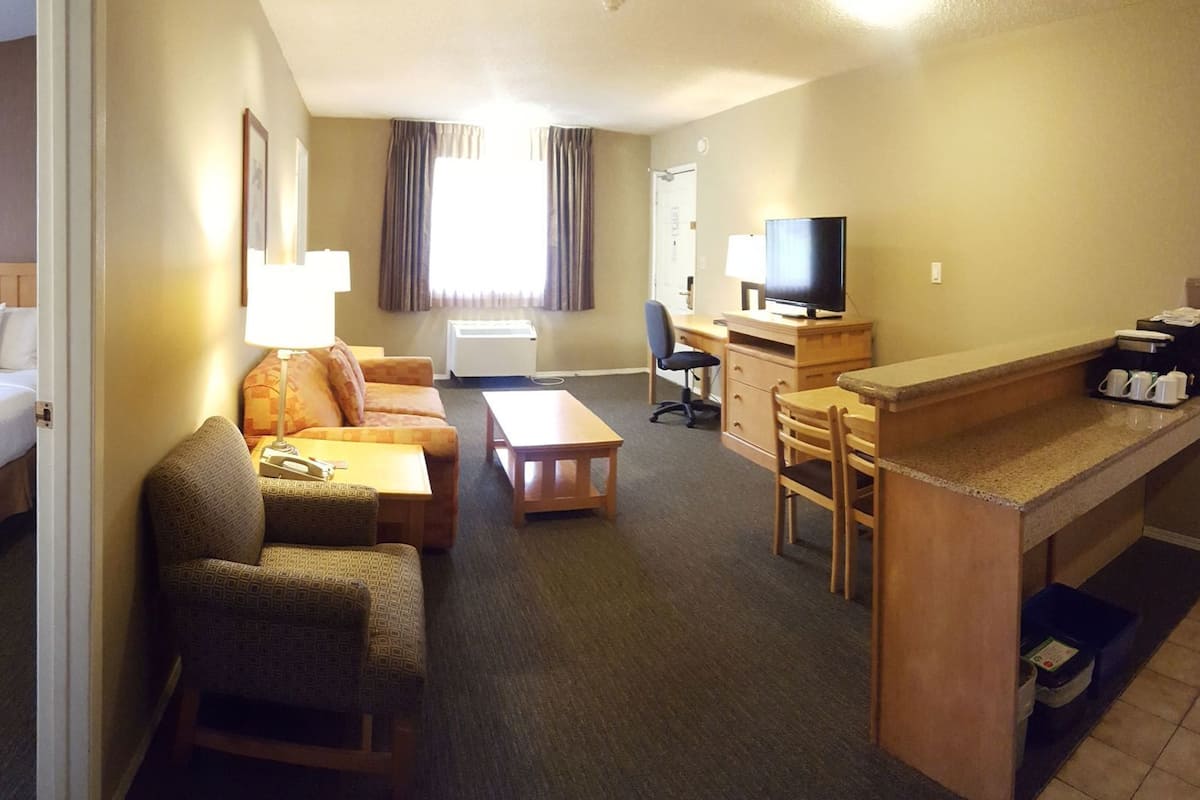 Premium bedding, desk, blackout curtains, iron/ironing board