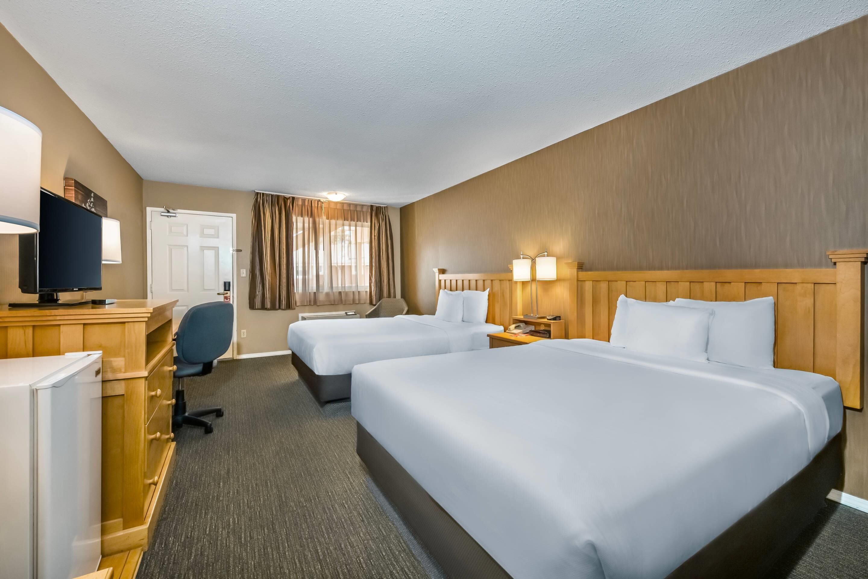 Deluxe kamer, 2 queensize bedden, niet-roken | Luxe beddengoed, een bureau, verduisterende gordijnen