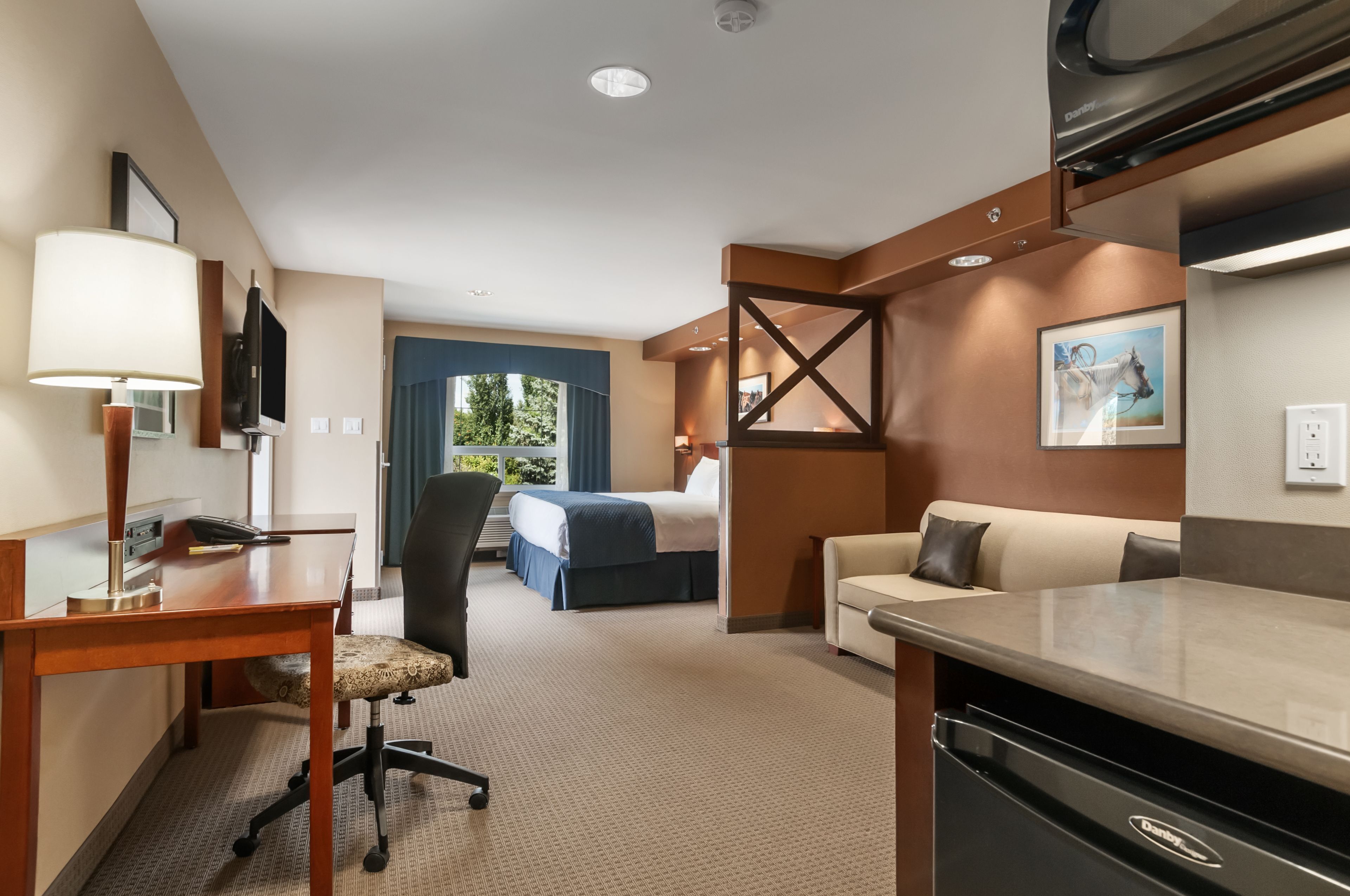 Pillow-top beds, desk, blackout curtains, iron/ironing board