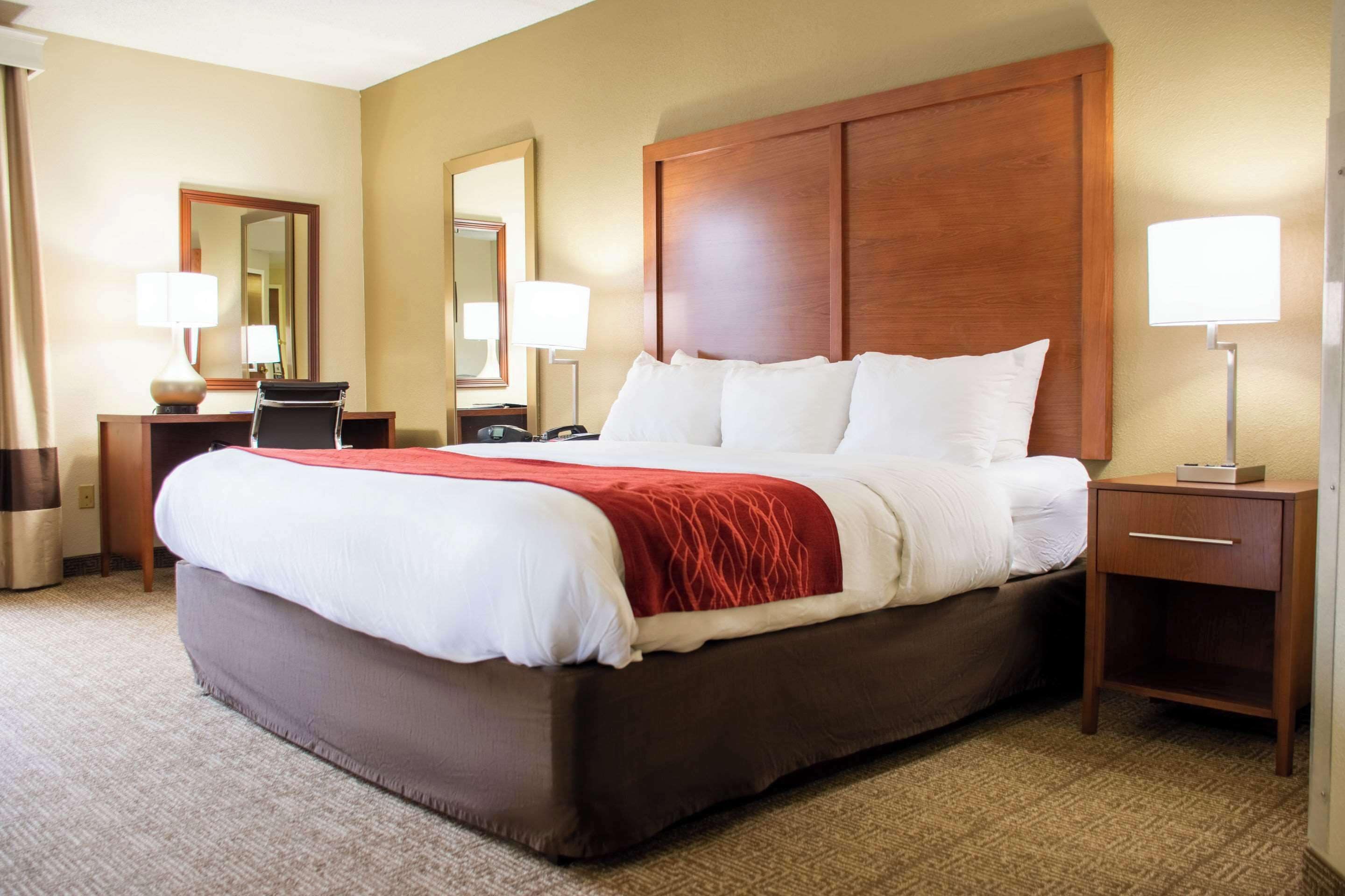 Desk, laptop workspace, blackout curtains, iron/ironing board