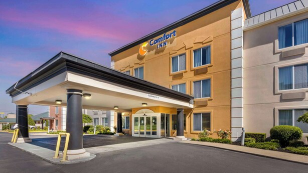 A Comfort Inn hotel with a clear entrance, a covered parking area, and a well-maintained exterior.