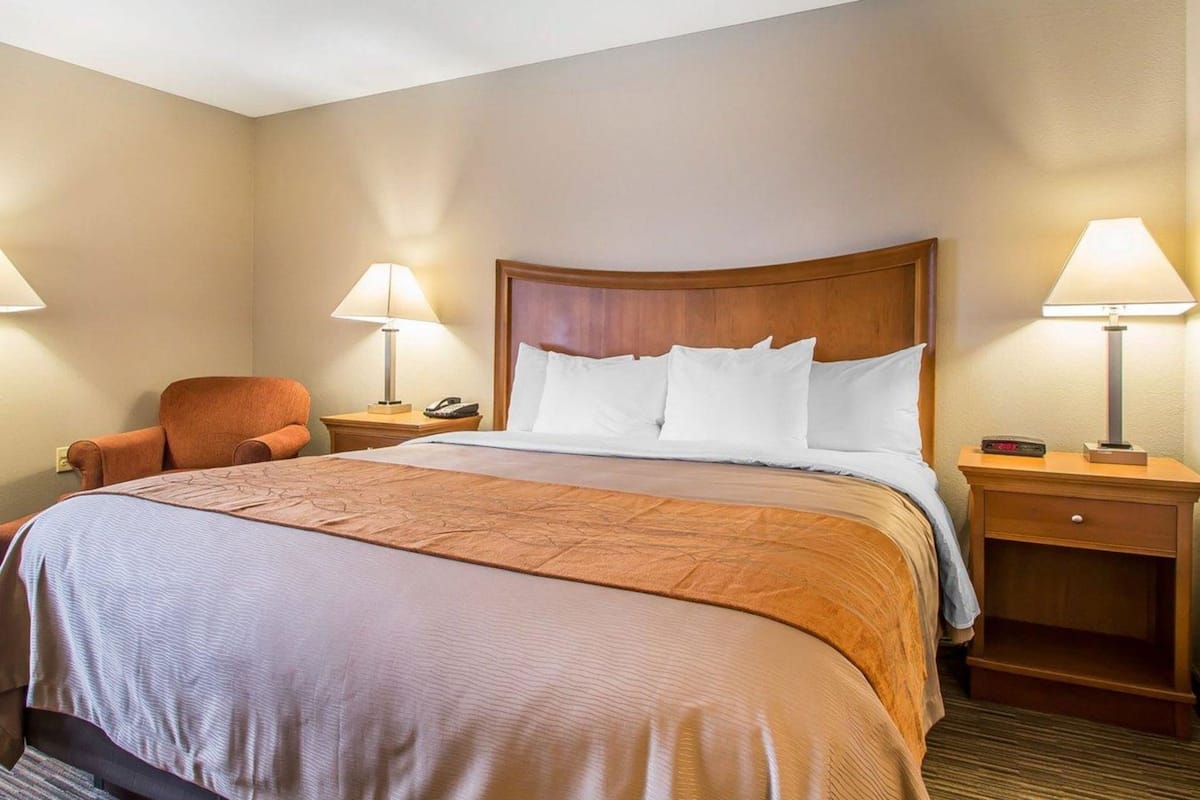 Premium bedding, desk, blackout curtains, iron/ironing board