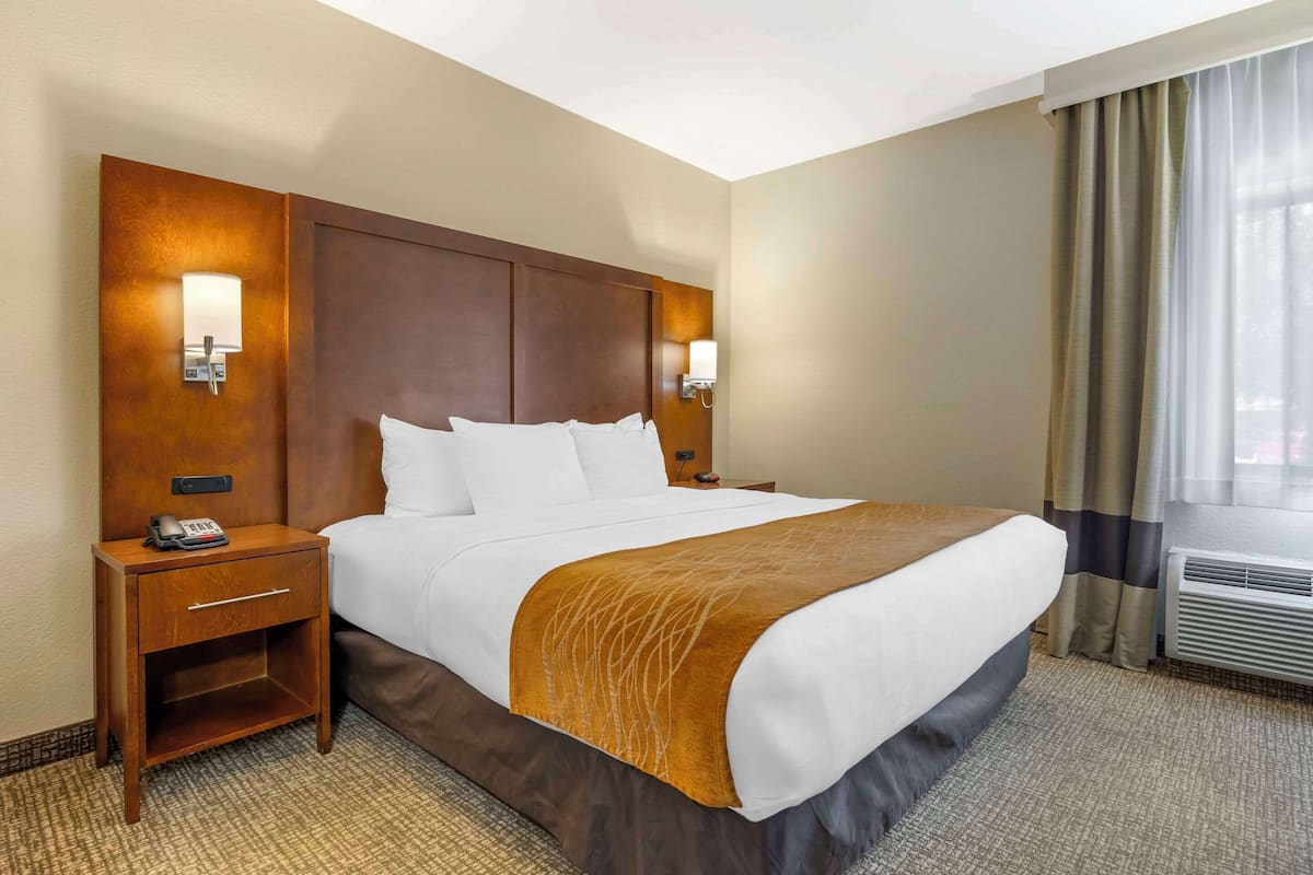 Premium bedding, desk, blackout drapes, iron/ironing board