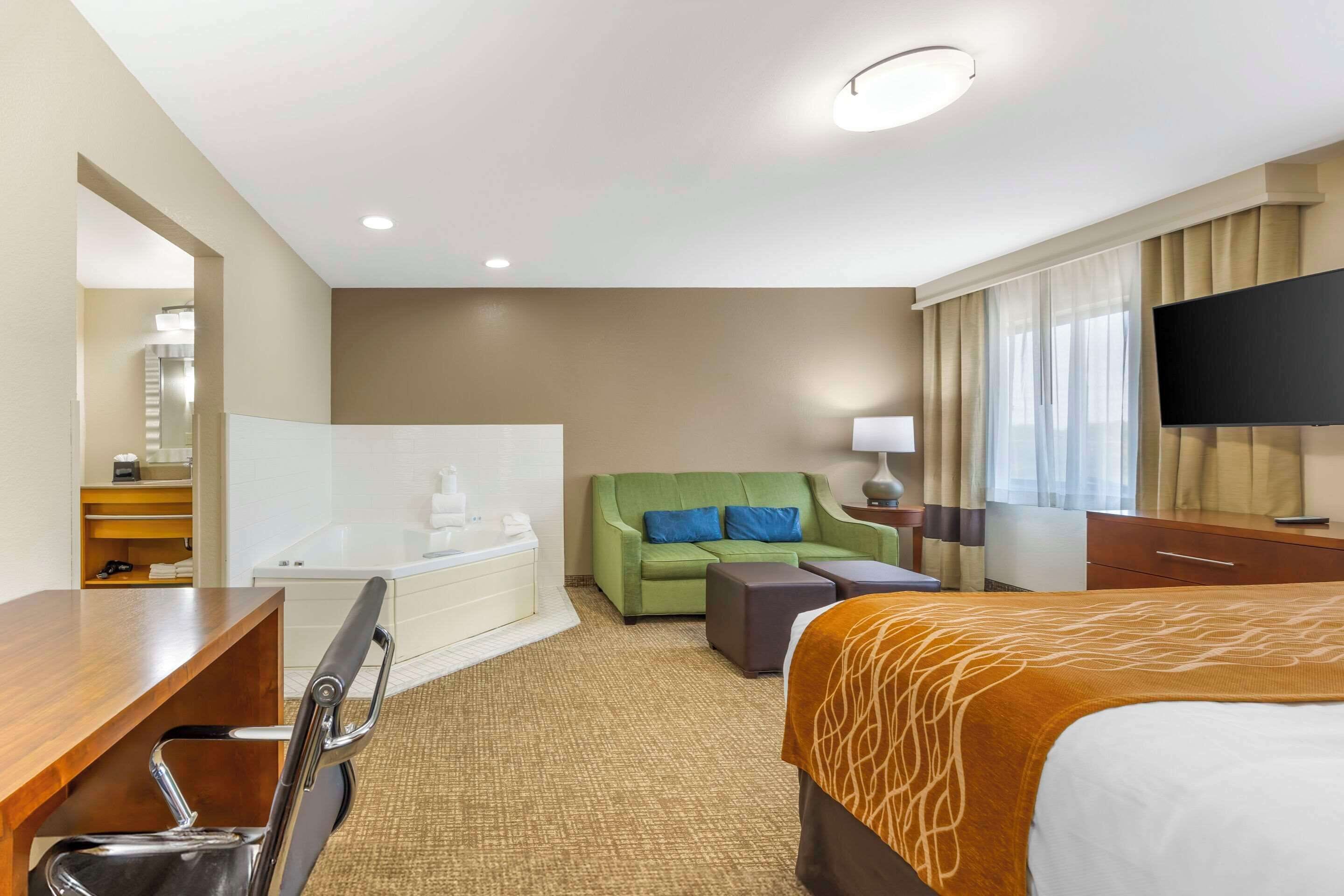 premium bedding, desk, blackout curtains, iron/ironing board