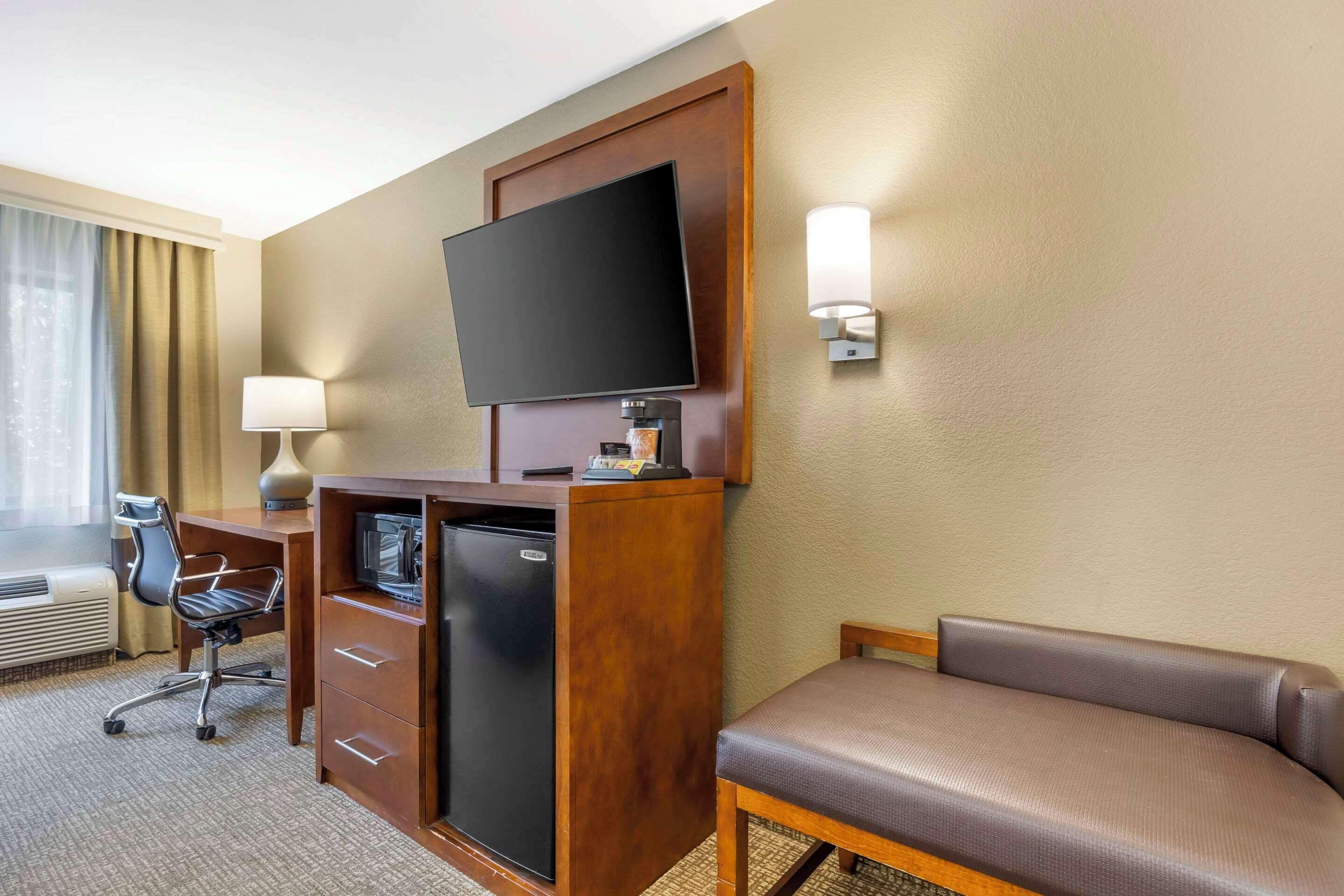 premium bedding, desk, blackout curtains, iron/ironing board