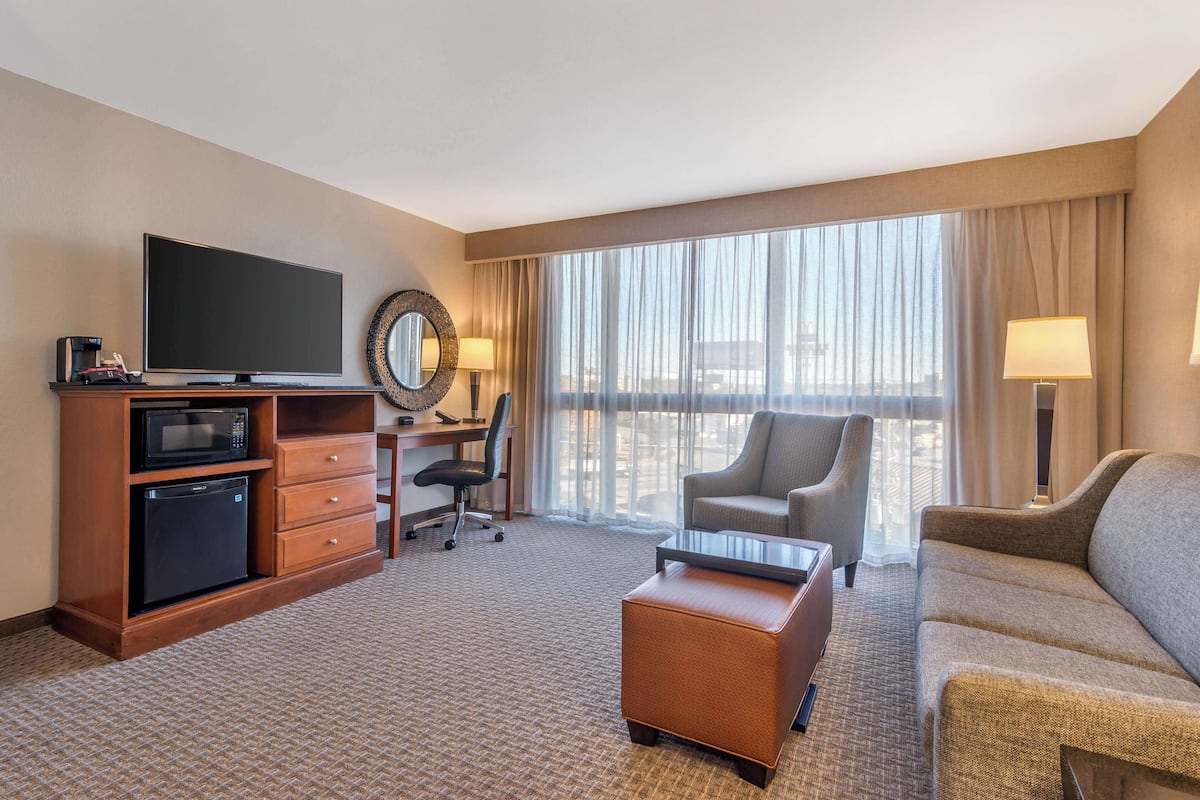 deluxe suite, 1 king bed with sofa bed, refrigerator & microwave (upper floor, oversized, 2 rooms) | 1 bedroom, desk, laptop workspace, blackout curtains