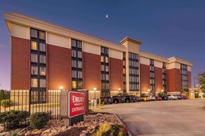 Welcome to Drury Inn & Suites, featuring a modern exterior with a brick and beige design.