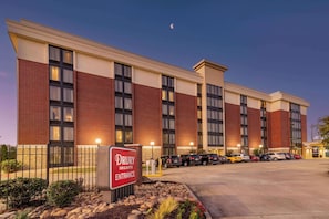 Welcome to Drury Inn & Suites, featuring a modern exterior with a brick and beige design.