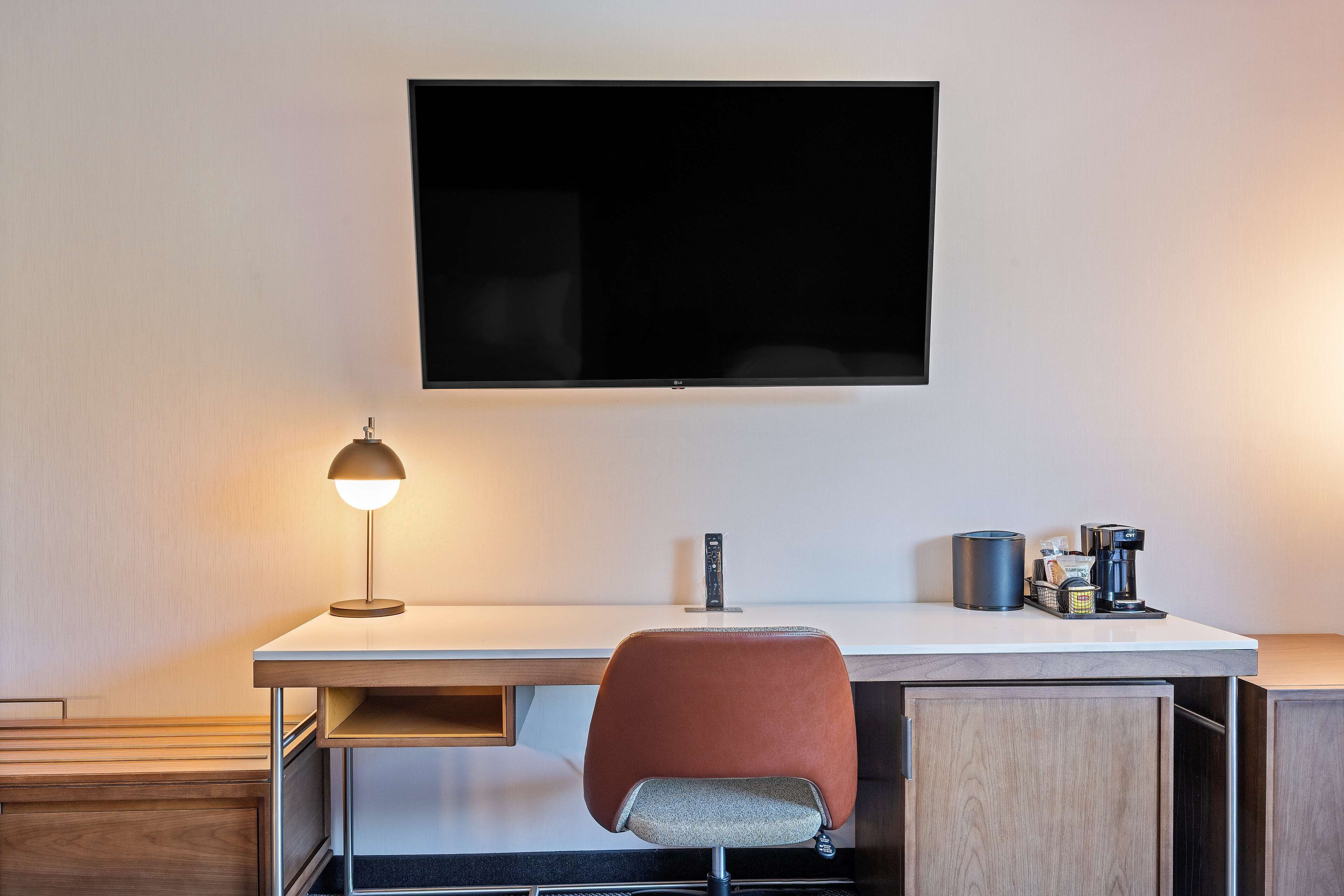 desk, laptop workspace, blackout curtains, iron/ironing board