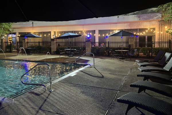 Outdoor pool, open 10:00 AM to 10:00 PM, pool umbrellas, sun loungers