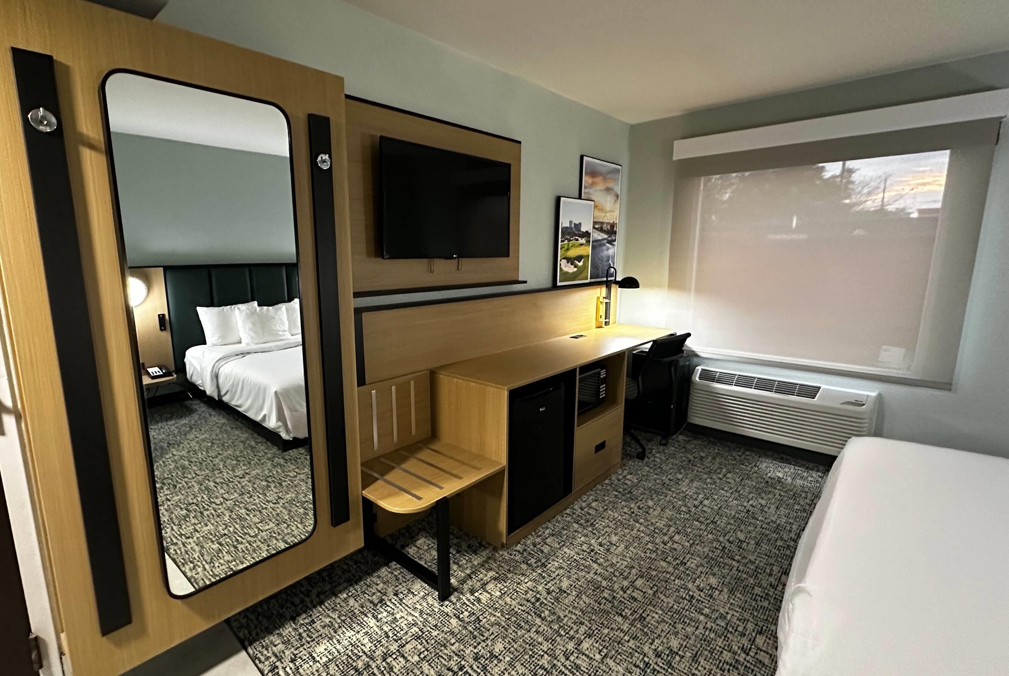 Desk, blackout drapes, iron/ironing board, free cribs/infant beds