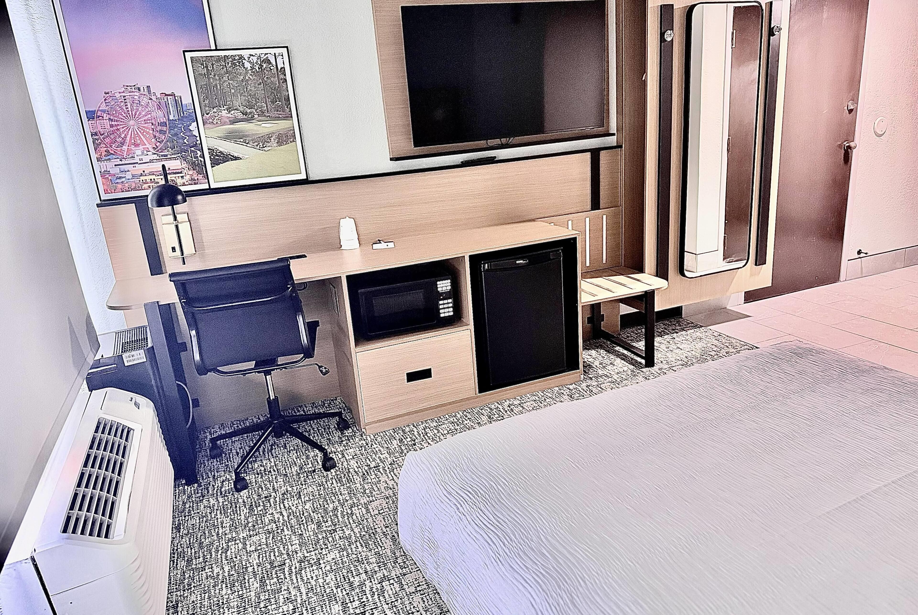 Desk, blackout drapes, iron/ironing board, free cribs/infant beds