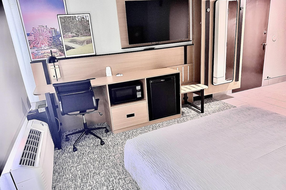 Desk, blackout drapes, iron/ironing board, free cribs/infant beds