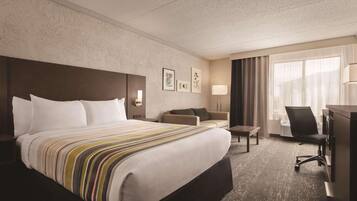 Habitación, 1 cama Queen size, para no fumadores | Escritorio, cortinas blackout y insonorización