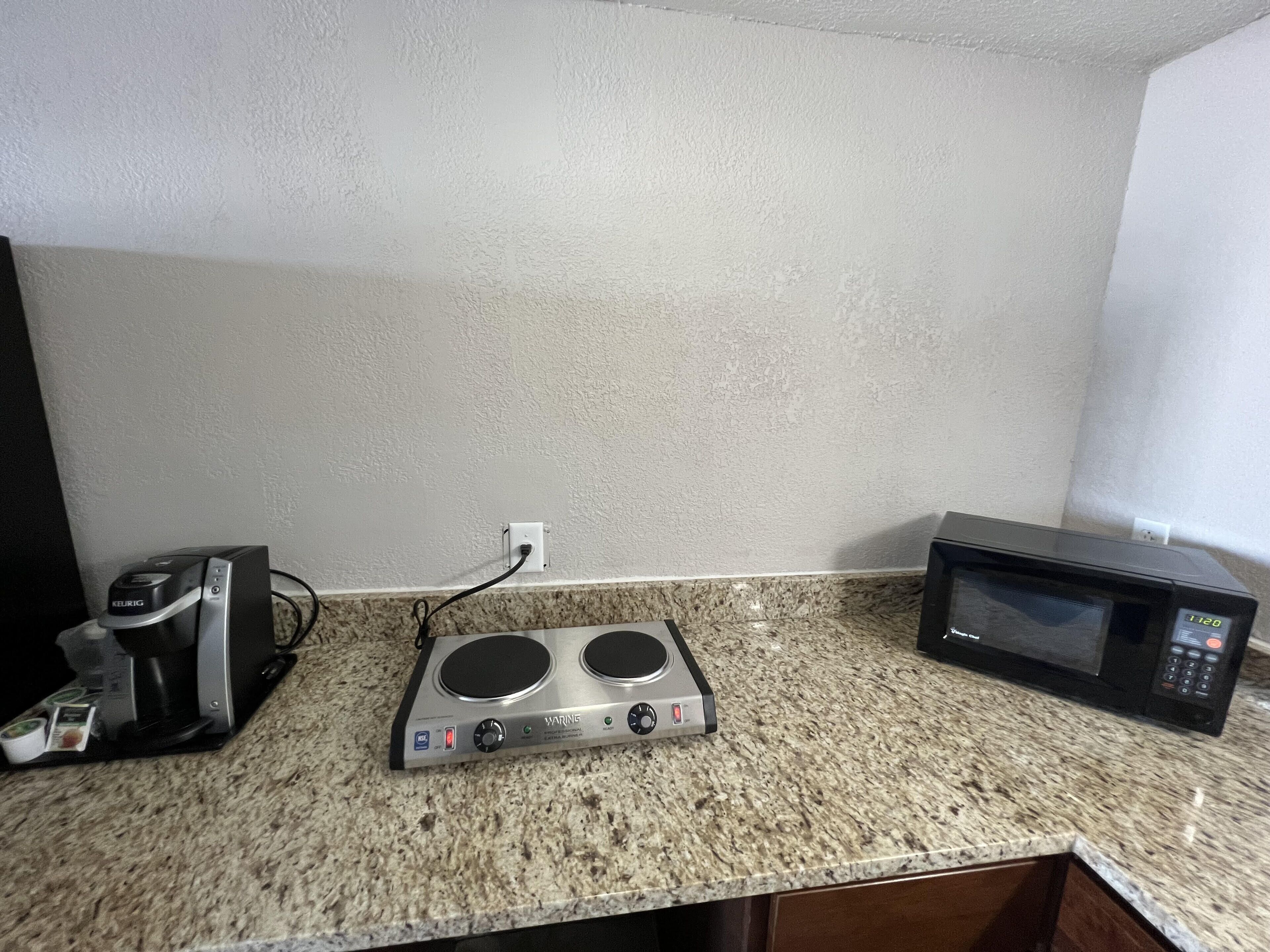 suite, 2 queen beds, non smoking | living area | 40-inch lcd tv with satellite channels, tv