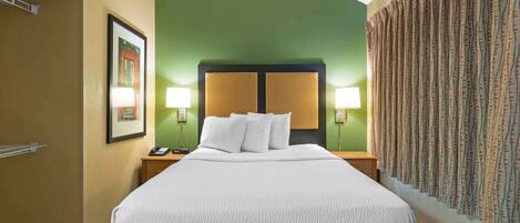 Deluxe Studio, 1 Queen Bed, Non Smoking | Pillowtop beds, desk, blackout drapes, iron/ironing board