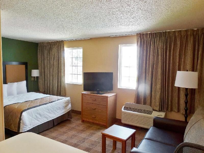 Pillowtop beds, desk, blackout drapes, iron/ironing board
