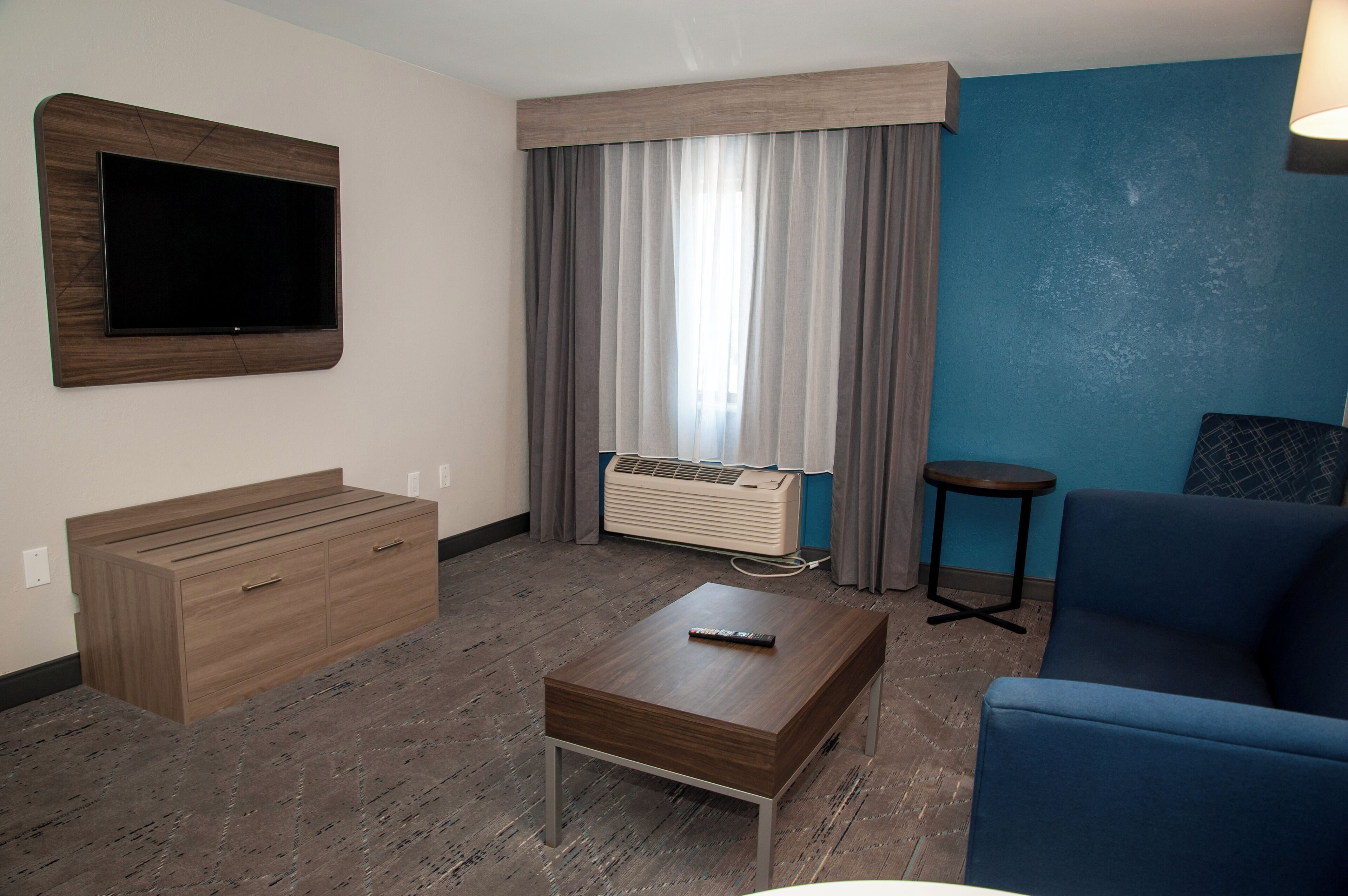suite, 1 king bed (extra living area) | 1 bedroom, desk, laptop workspace, iron/ironing board