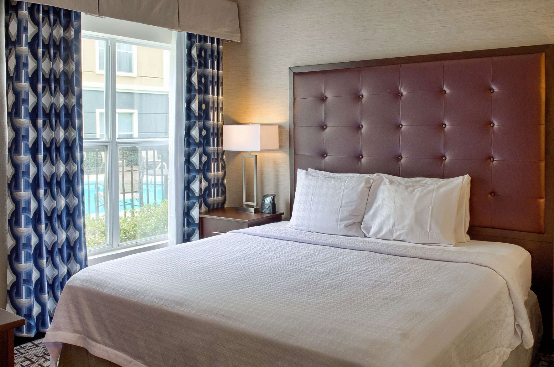 Premium bedding, down comforters, desk, iron/ironing board