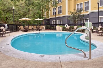 Outdoor pool, open 9:00 AM to 9:00 PM, pool umbrellas, pool loungers