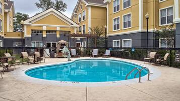 Outdoor pool, open 9:00 AM to 9:00 PM, pool umbrellas, pool loungers