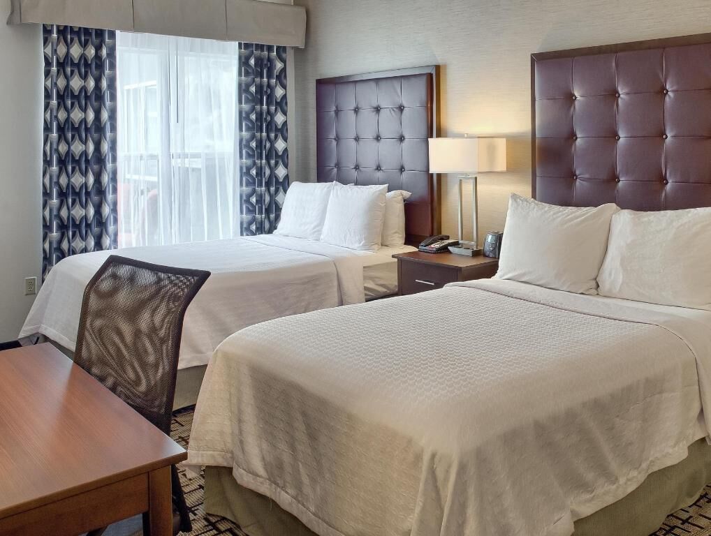 Premium bedding, down comforters, desk, iron/ironing board