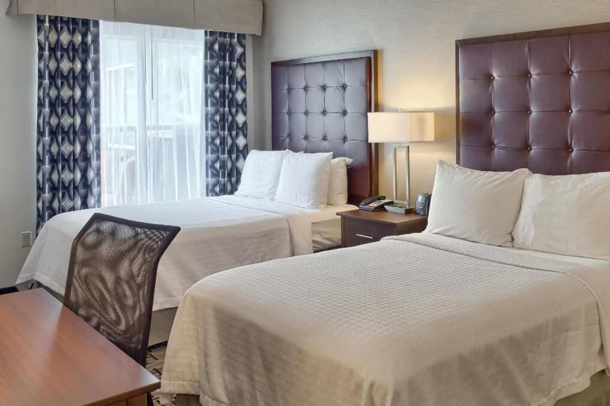 Premium bedding, down comforters, desk, iron/ironing board