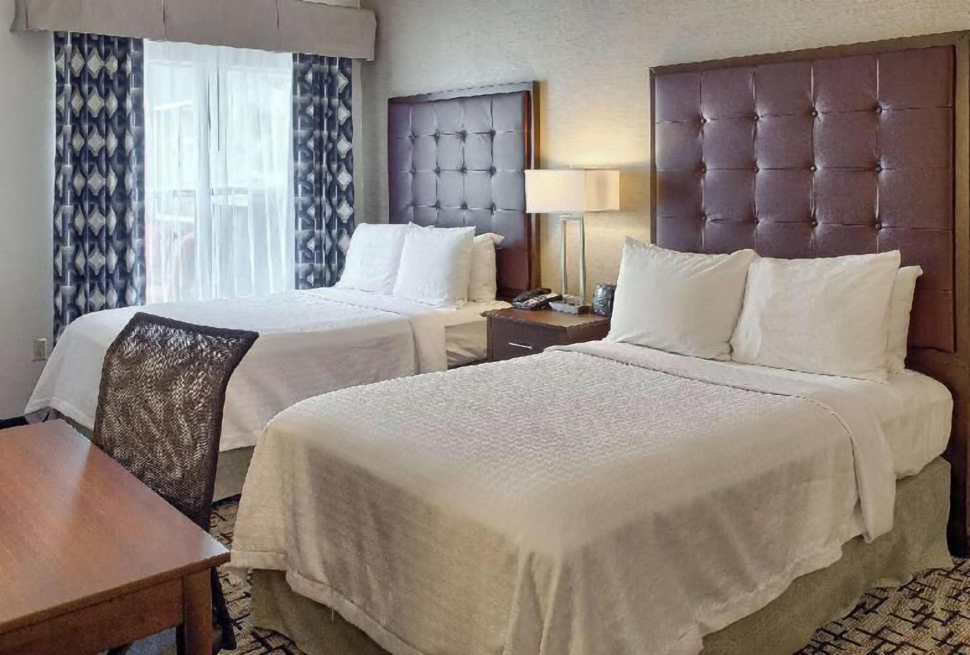 Premium bedding, down comforters, desk, iron/ironing board