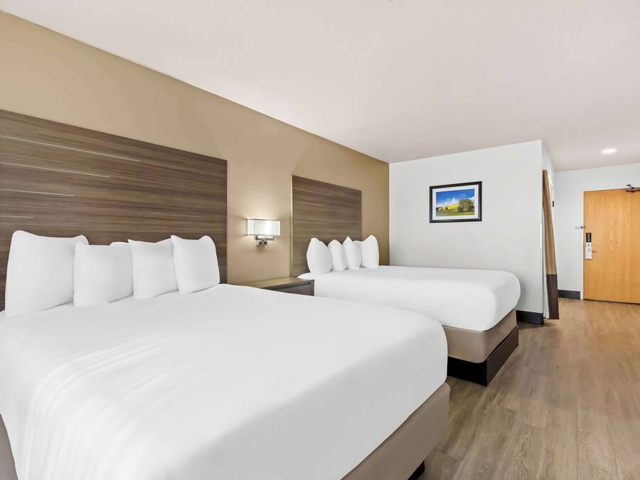 Premium bedding, pillowtop beds, desk, laptop workspace