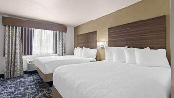 Premium bedding, pillowtop beds, desk, laptop workspace