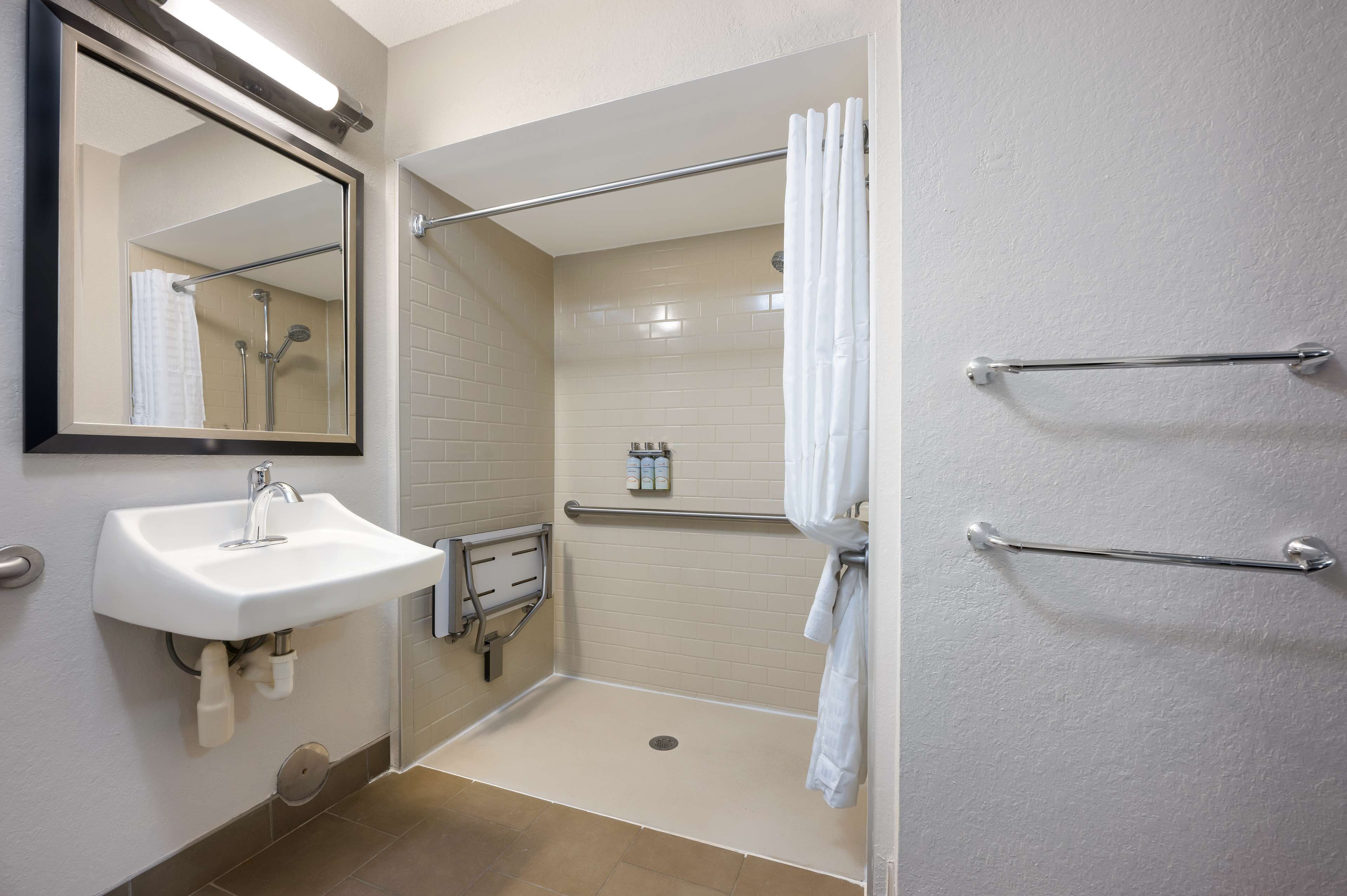 combined shower/bathtub, hair dryer, towels, soap