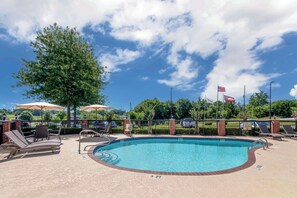 Seasonal outdoor pool, open 8:00 AM to 10:00 PM, sun loungers