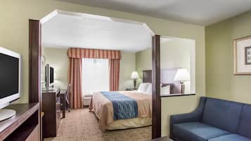 Suite, 1 King Bed, Non Smoking | In-room safe, desk, soundproofing, iron/ironing board
