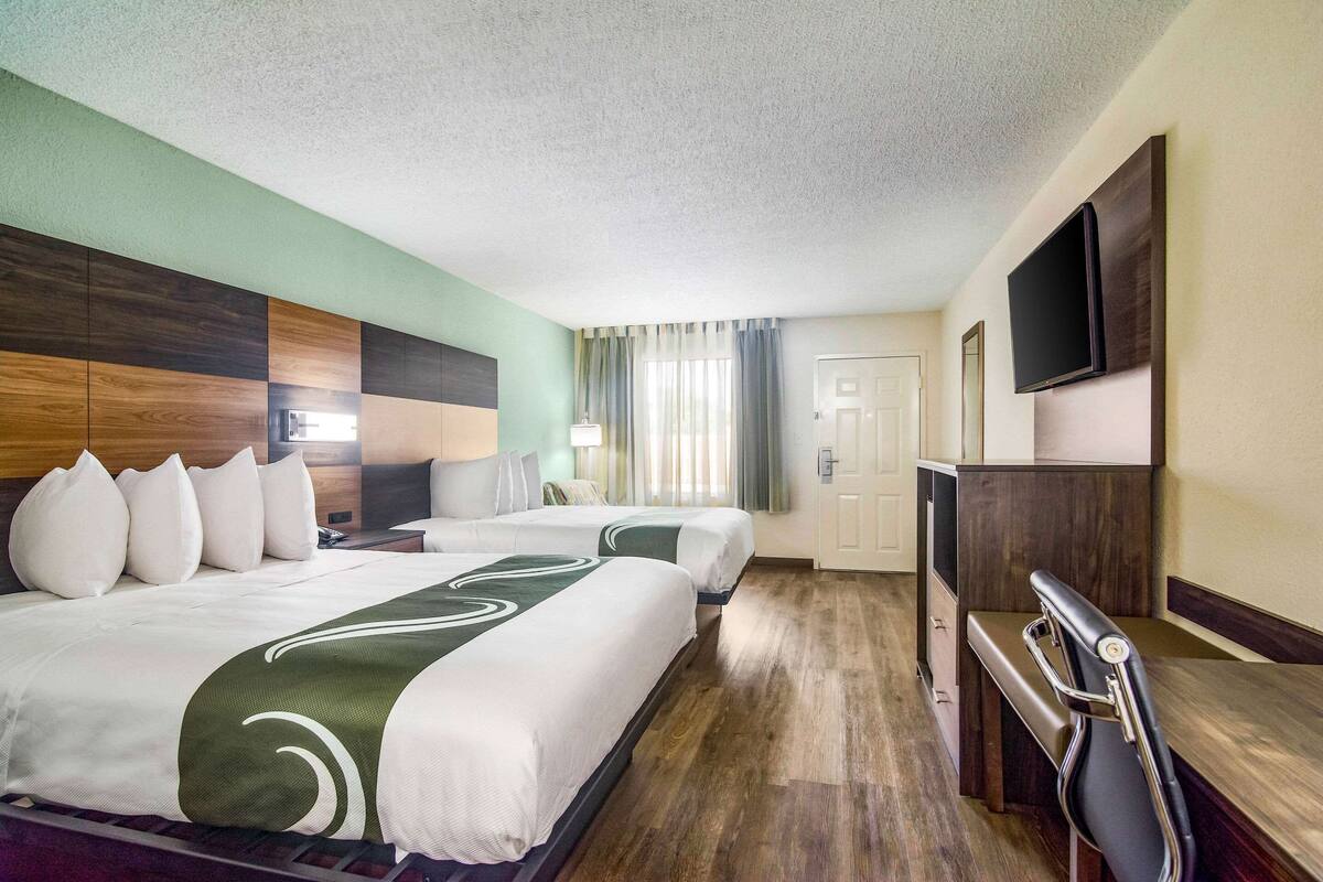 Standard Room, 2 Queen Beds, Non Smoking | Premium bedding, desk, laptop workspace, blackout drapes