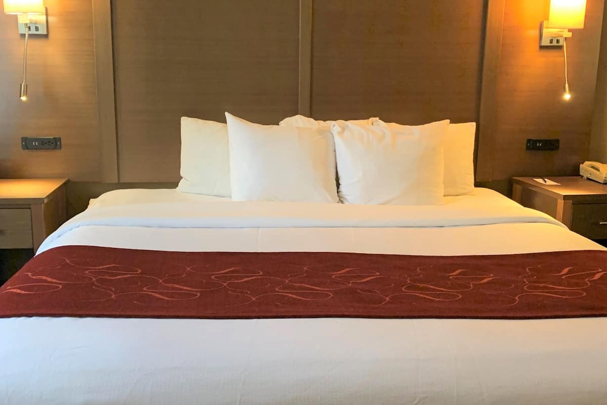 desk, laptop workspace, blackout curtains, iron/ironing board