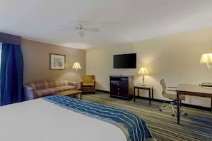 Executive Suite, 1 King Bed, Non Smoking | Desk, laptop workspace, blackout drapes, iron/ironing board