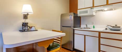 Desk, laptop workspace, blackout curtains, iron/ironing board