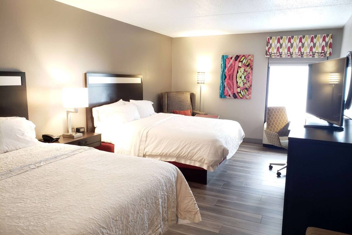 room, 2 queen beds, non smoking | iron/ironing board, free cots/infant beds, free rollaway beds, free wifi