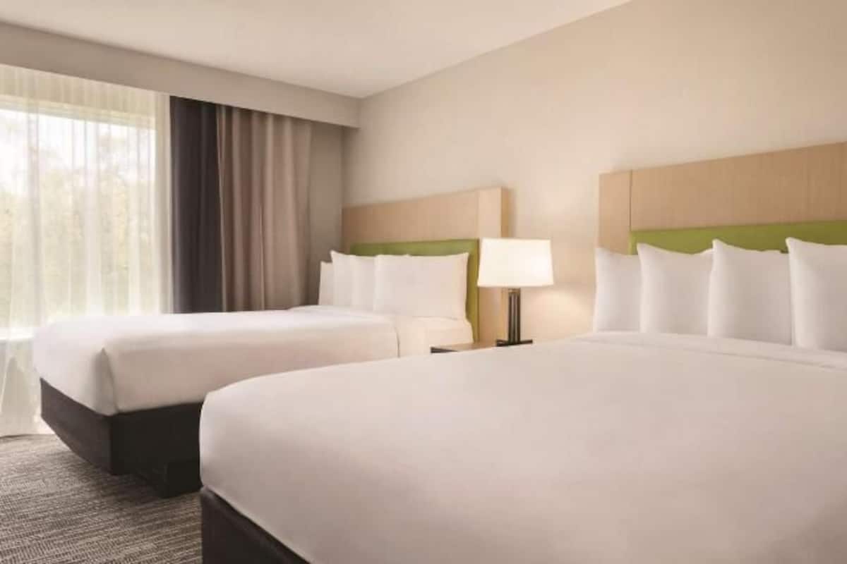 Hypo-allergenic bedding, in-room safe, desk, laptop workspace